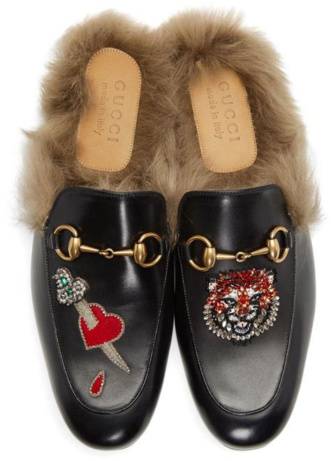 loafers with lion crest gucci|Gucci g loafers.